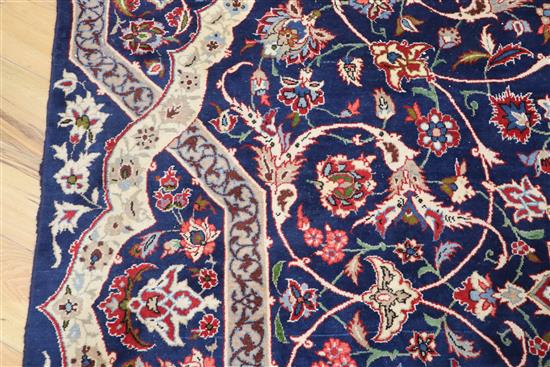 A Tabriz blue ground carpet, 410 x 272cm